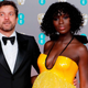 Joshua Jackson and Jodie Turner Smith pose on the red carpet upon arrival at the BAFTA British Academy Film Awards on February 2, 2020.